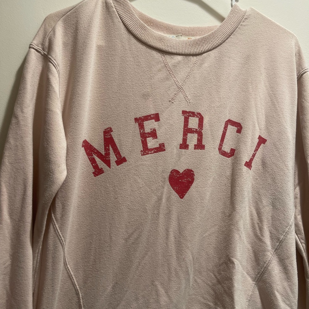 Merci crewneck.